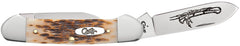 CASE 00263 AMBER BONE PEACH SEED JIG CANOE